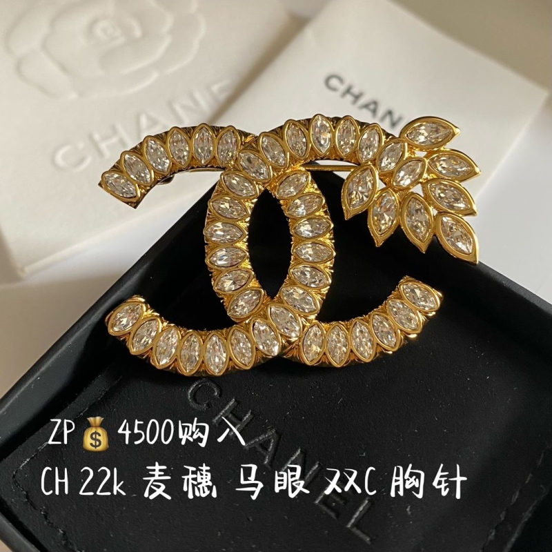 Ch**el brooches